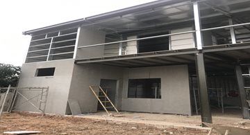 Vật liệu Toàn cầu: Tấm Xi Măng Cemboard Thái Lan – Sức mạnh Thích ứng và Thẩm mỹ vượt Biên giới